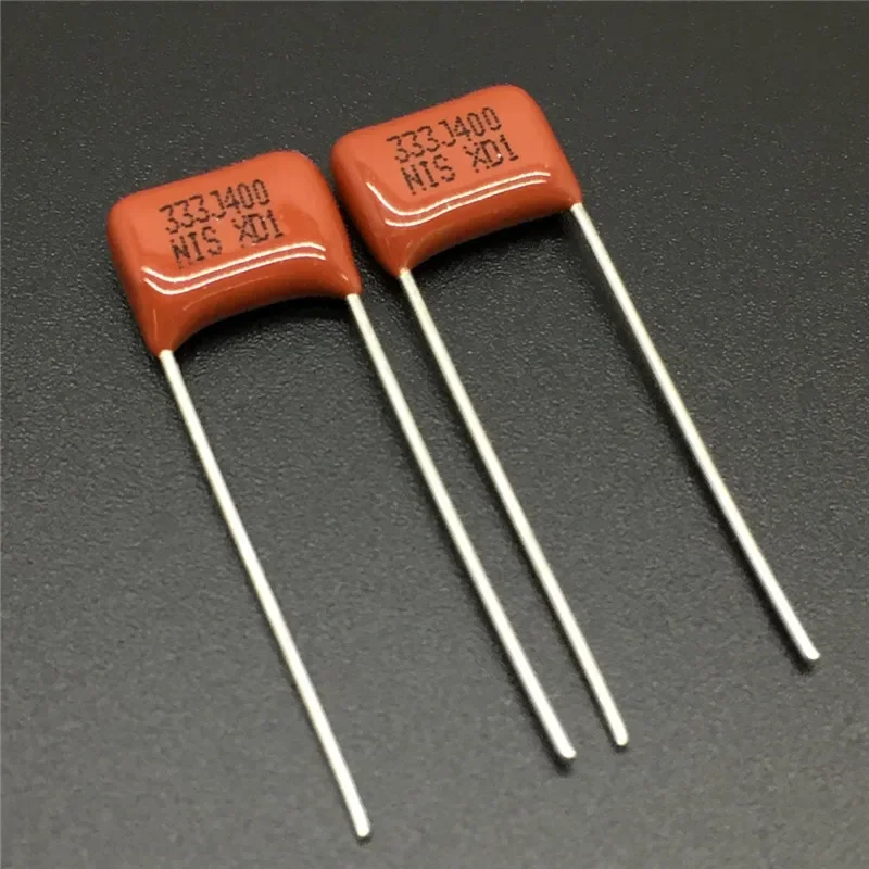 10 Stück/100 Stück Japan NISSEI CBB Kondensator MMX 400 V 333 J 5 % 0,033 uF 33 nF Pitch = 7,5 mm metallisierter Polyesterfolienkondensator