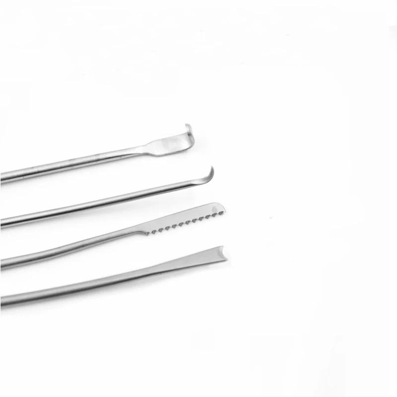 Spatule décapante longitudinale, couteau dentelé pour réduire le bloggmuscle, petite incision sur la surface des frmetailles