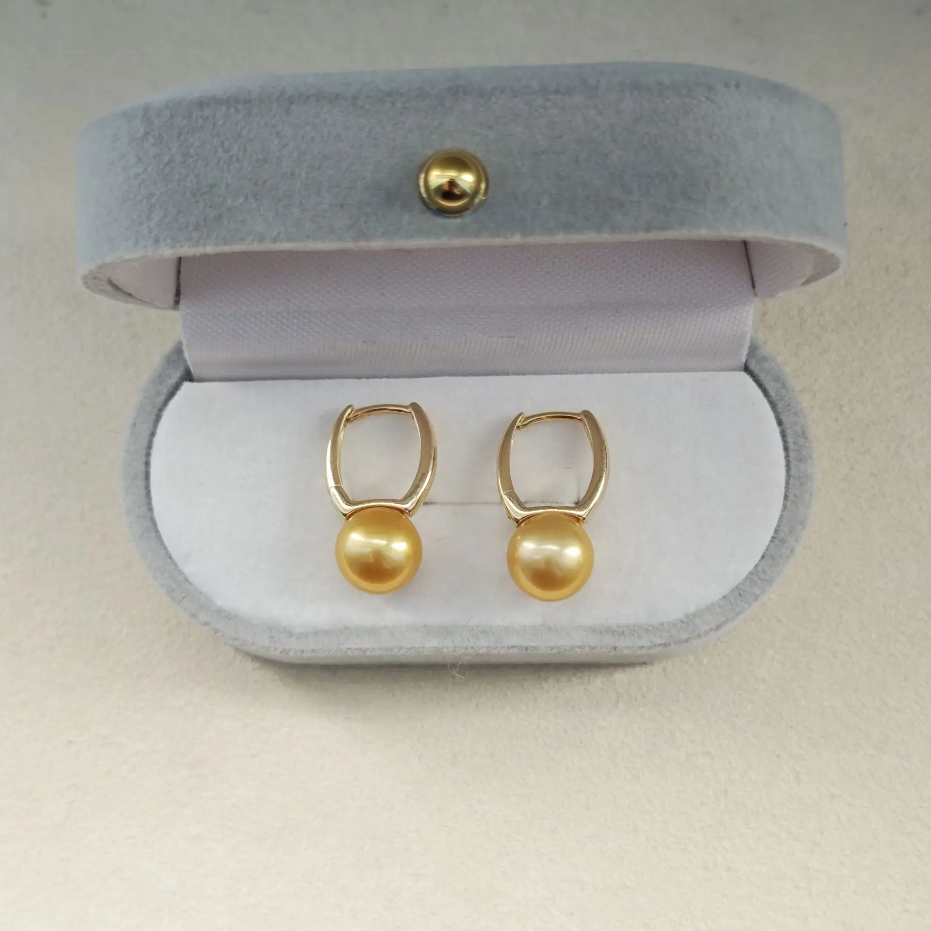 

Элегантные серьги AAAA9-10 мм 10-11 мм Натуральный круглый золотой жемчуг Южного моря Серьги 925s