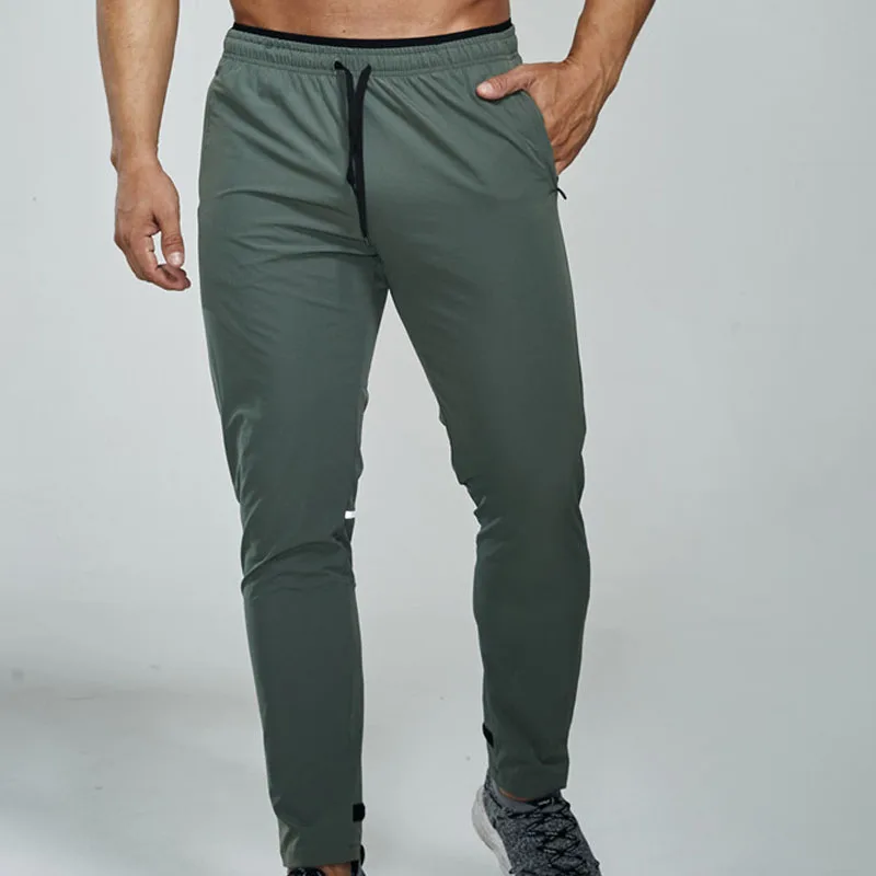 Primavera verão de secagem rápida estiramento reflexivo corredores correndo calças compridas M-3XL novos esportes homem calças de fitness masculino my807