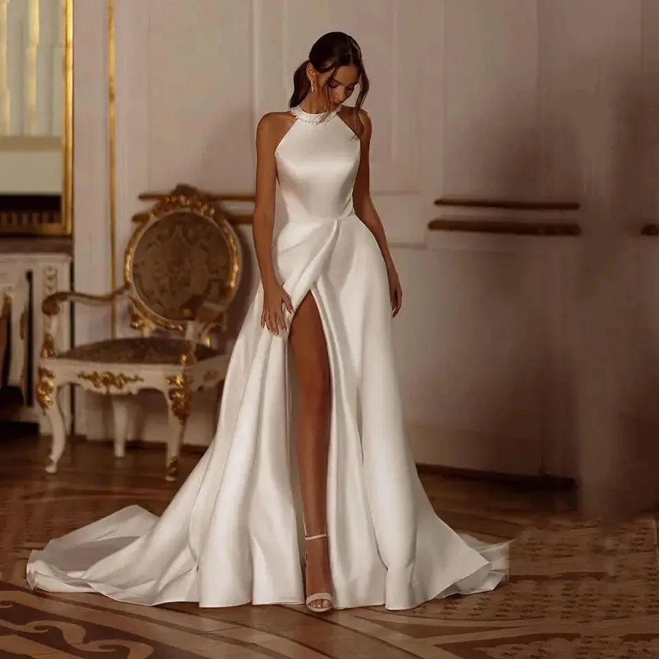 

Simple A Line Beach Wedding Dress Pearls Beaded Halter Neck Bow Sexy Side Split Boho Bridal Gown With Pockets White Satin Long