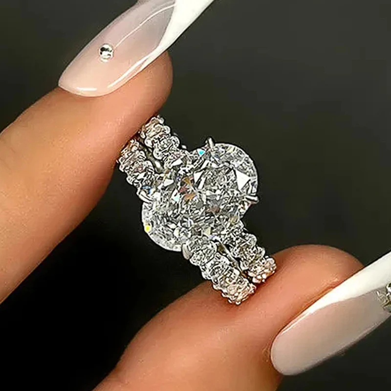 Huitan funkelnden ovalen Zirkonia 2 Stück Set Ringe für Frauen Luxus Hochzeit Verlobung weibliche Accessoires neuen Modeschmuck