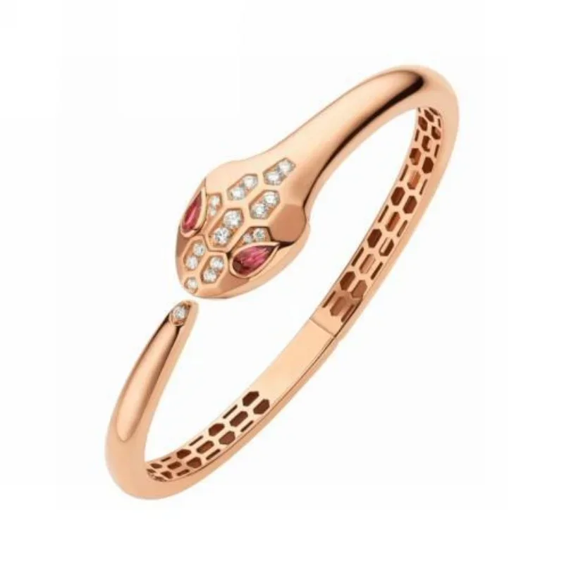 

Rose Gold Serpent Bangle with Diamond and Ruby Accents