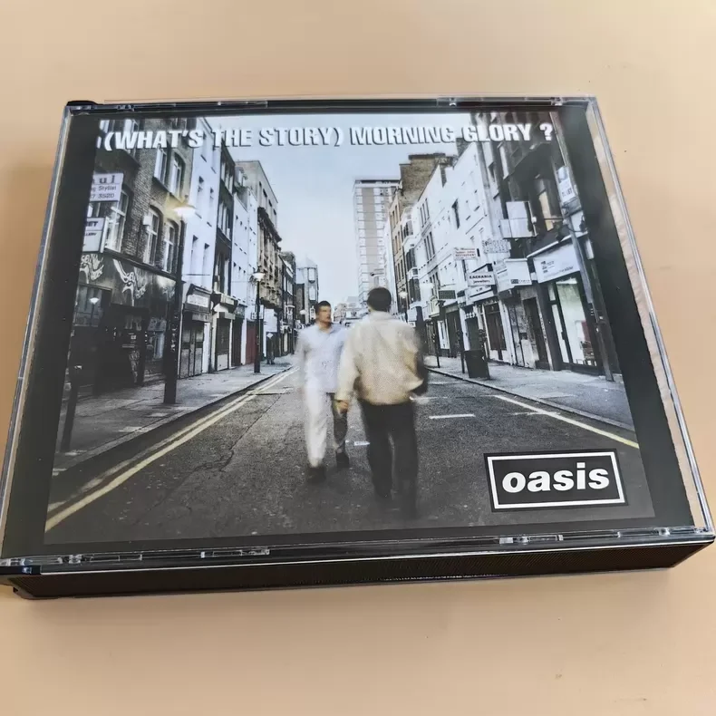 

Британская рок-группа Liam-Oasis, альбом «What's The Story Morning Glory», 3CD, делюкс-версия, абсолютно новый, нераспечатанный музыкальный диск, музыкальные подарки.