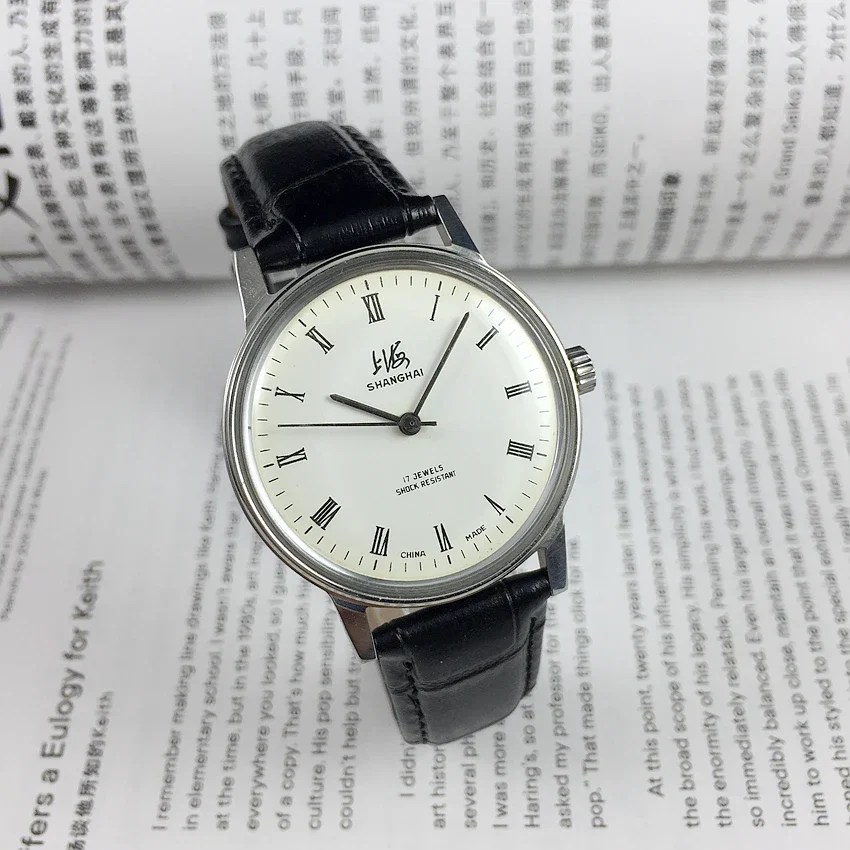 

Original Shanghai 8120 all steel Roman white face manual mechanical men's watch with a diameter of 36mm