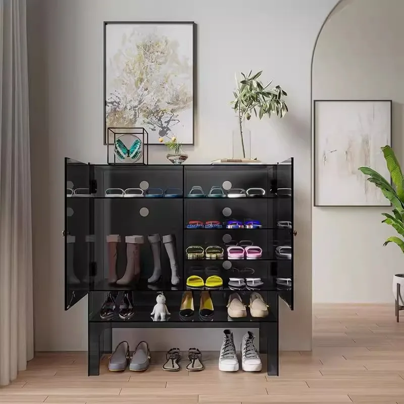 

The Modern Entryway Solution: A Transparent Acrylic Shoe Cabinet with Doors.