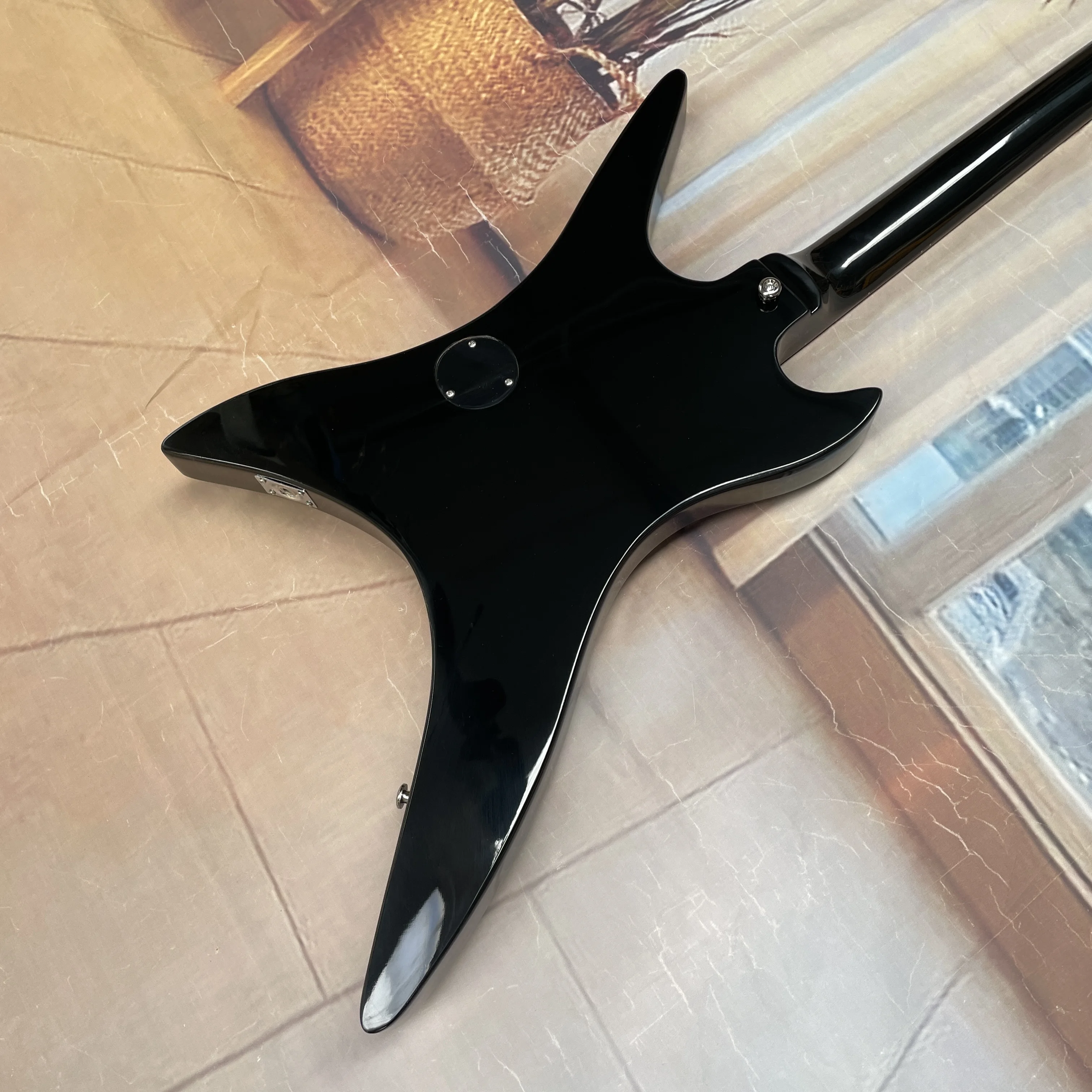 6-string black electric guitar with dual pickups and a rosewood fingerboard that feels smooth guitars. Heavy metal rock guitarra view 6