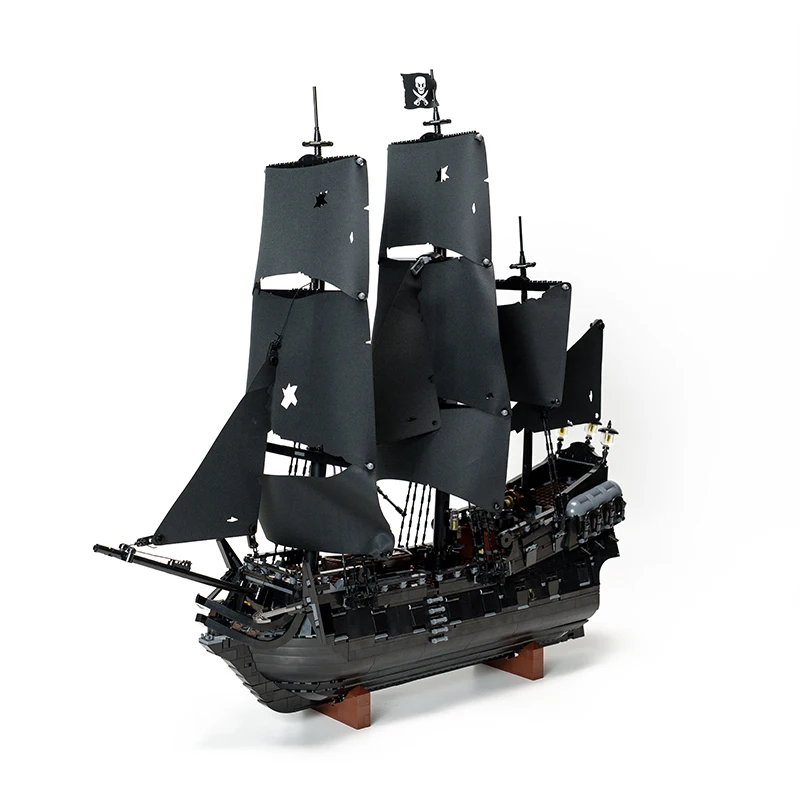 Een MINISO Pirate Black Pearl-schip, een houten scheepsmodel, Caribisch avonturen bouwsteenspeelgoed, een kerstcadeau voor kinderen en