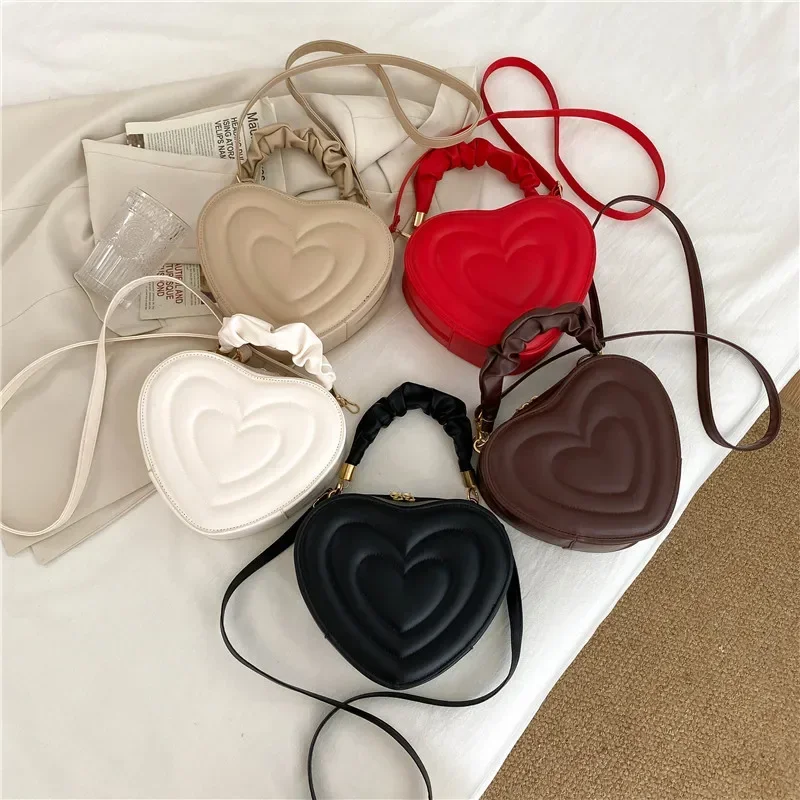 Retro heart-shaped cute bag fashion shoulder messenger bag solid color girl new shopping handbag