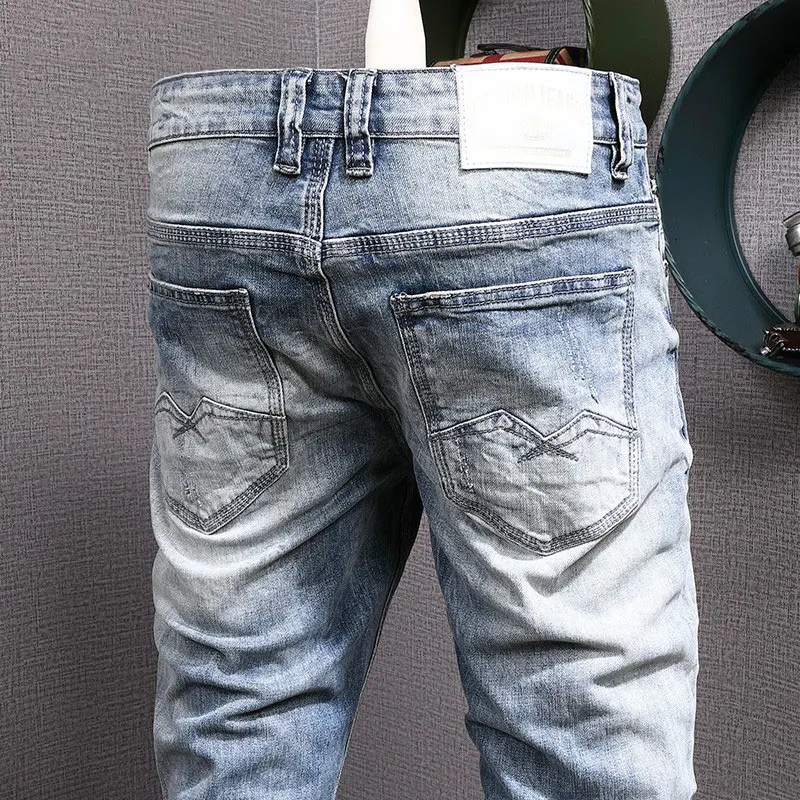 Fashion Designer Men Jeans Retro Light Blue Elastic Slim Fit Ripped Jeans Men Vintage Trousers Korean Style Denim Pants Hombre