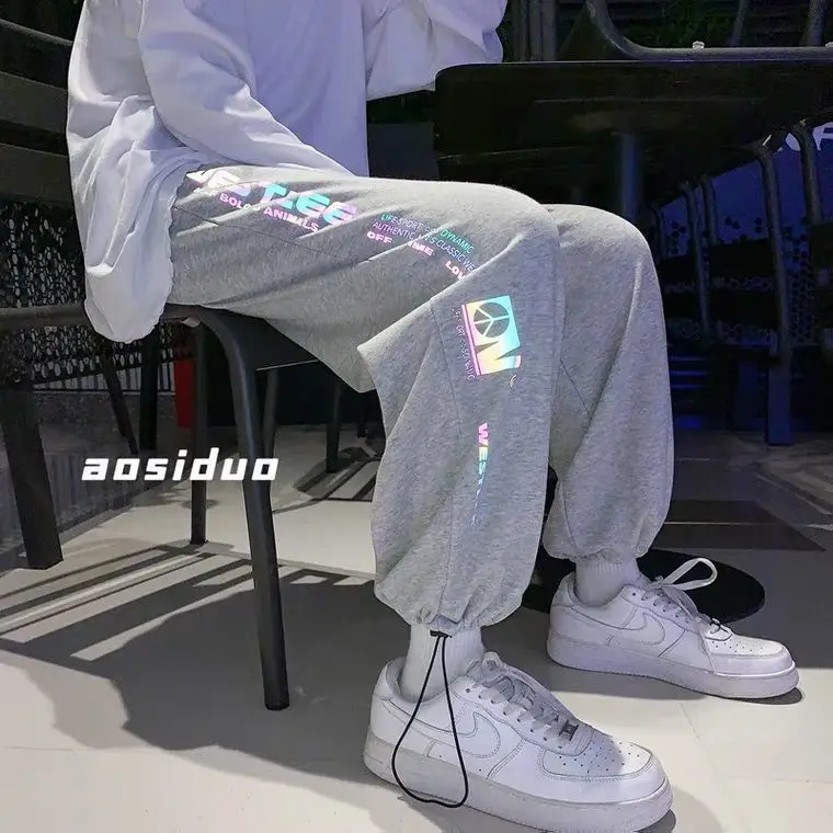 Homens reflexivos letras sweatpants estilo coreano solto ajuste corredores calças de perna reta casual streetwear calças moda ao ar livre