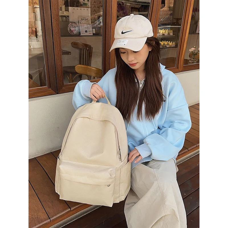 

2025 new large capacity Korean style backpack simple solid color all-match outdoor leisure shoulder bag for class travel backpac