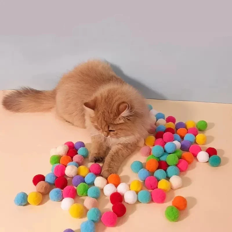 

Popular 100PC Cat Toys Interactive Release Pet Training Toys Cat Creative Mini Shooting Gun Game Elastic Plush Ball Toys