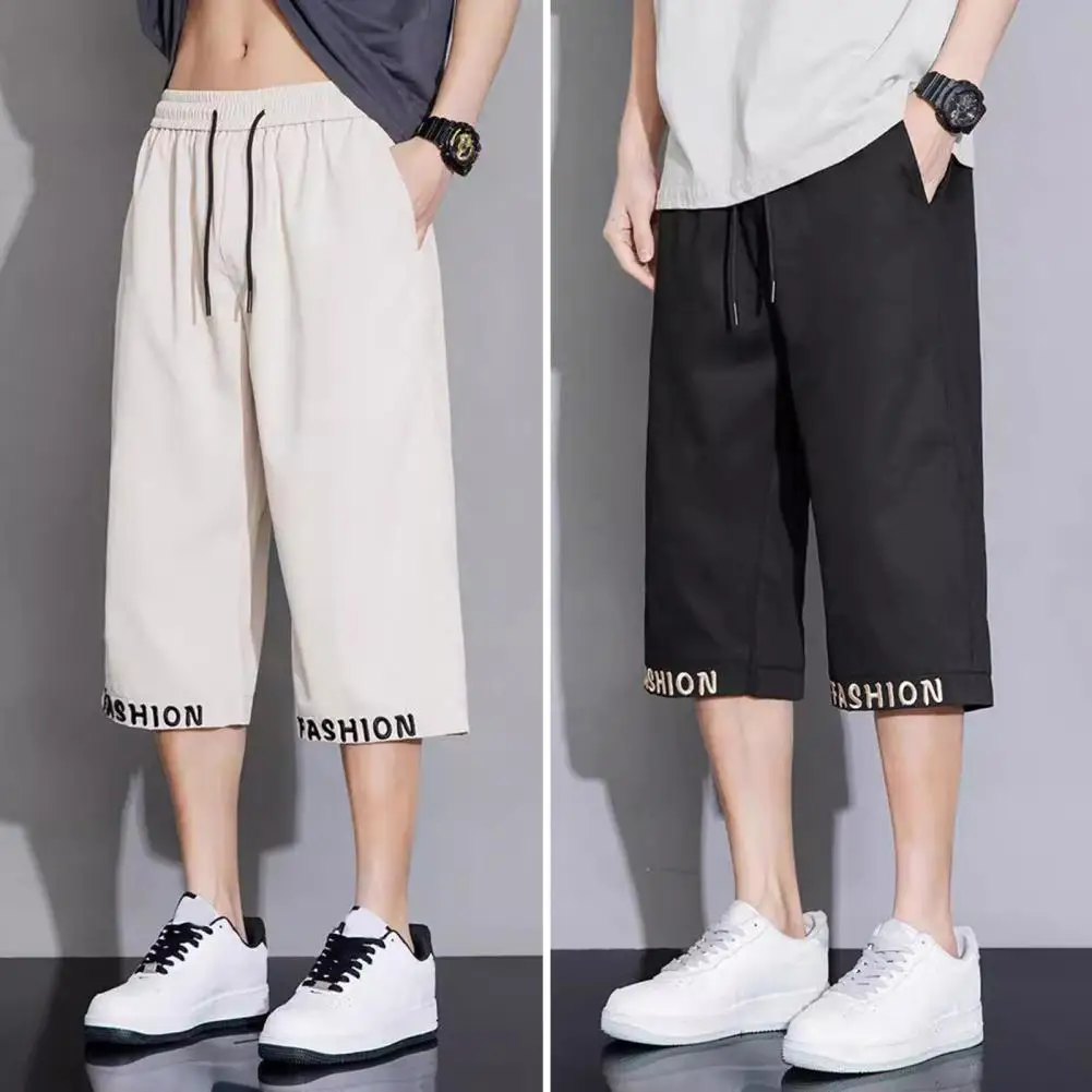 

Solid Color Cropped Trousers Stylish Men's Cropped Pants with Elastic Waistband Drawstring Featuring Letter for Casual