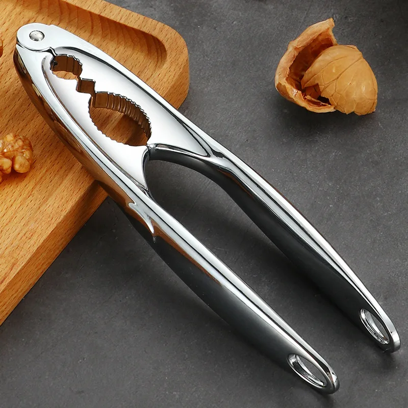 الصنوبر البقان البندق ذو طيات متعددة الوظائف سريعة الجوز المفرقع المقشر فتاحة الفولاذ المقاوم للصدأ كسارة البندق الجوز المفرقع