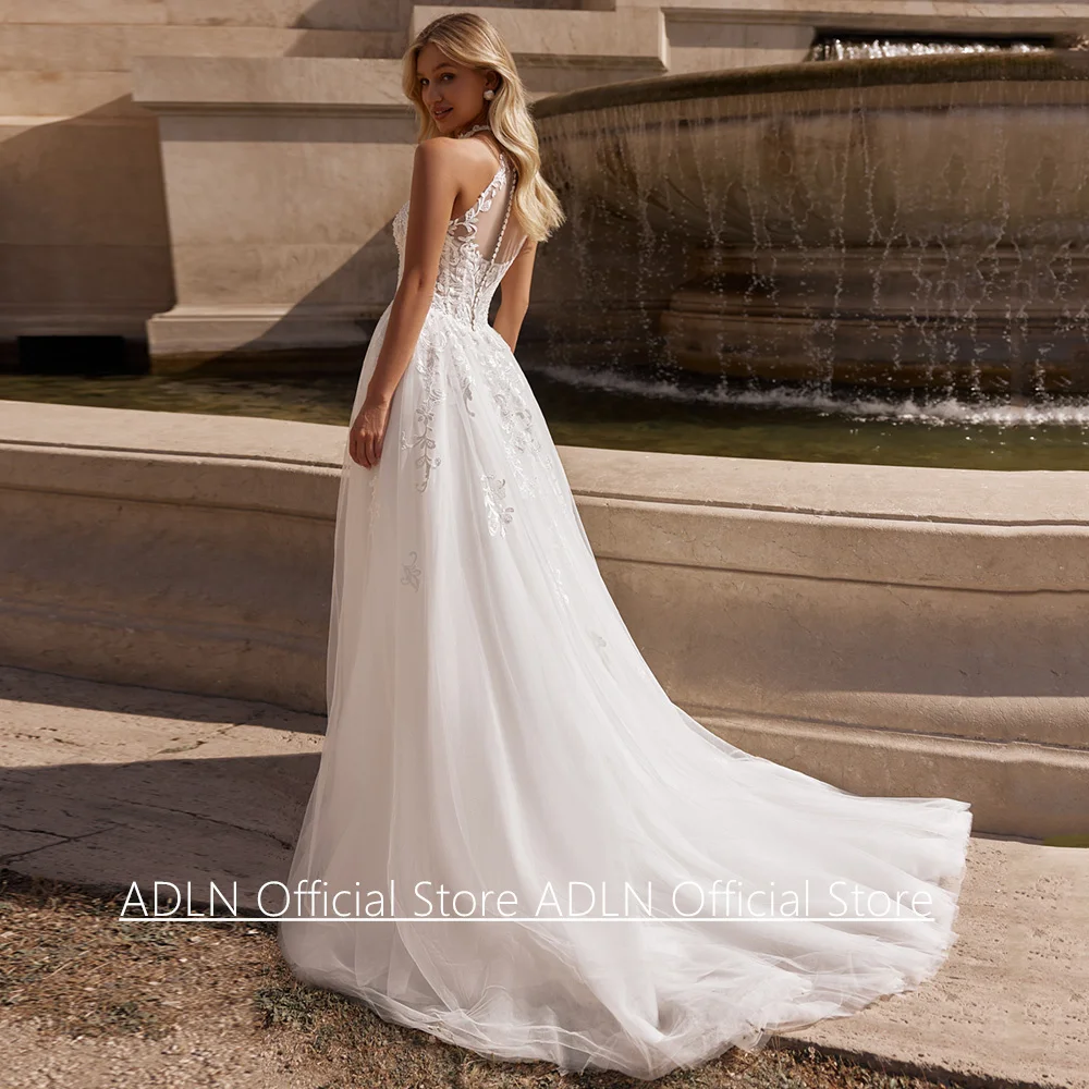 Abito da sposa sexy con scollo all'americana personalizzato senza maniche trasparente con applicazioni in pizzo Sweep Train Abito da sposa linea A per la sposa