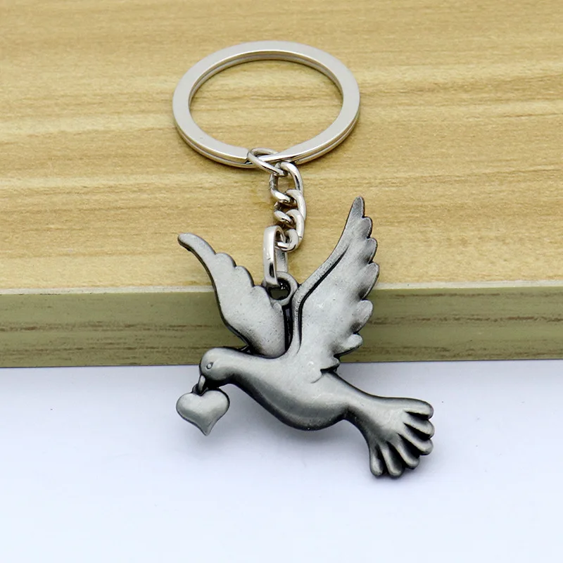 Catholic Christianity Jesus Holy Spirit Peace Dove Retro Jewelry Necklace Exquisite Car Keychain Pendant Keychain Wholesale