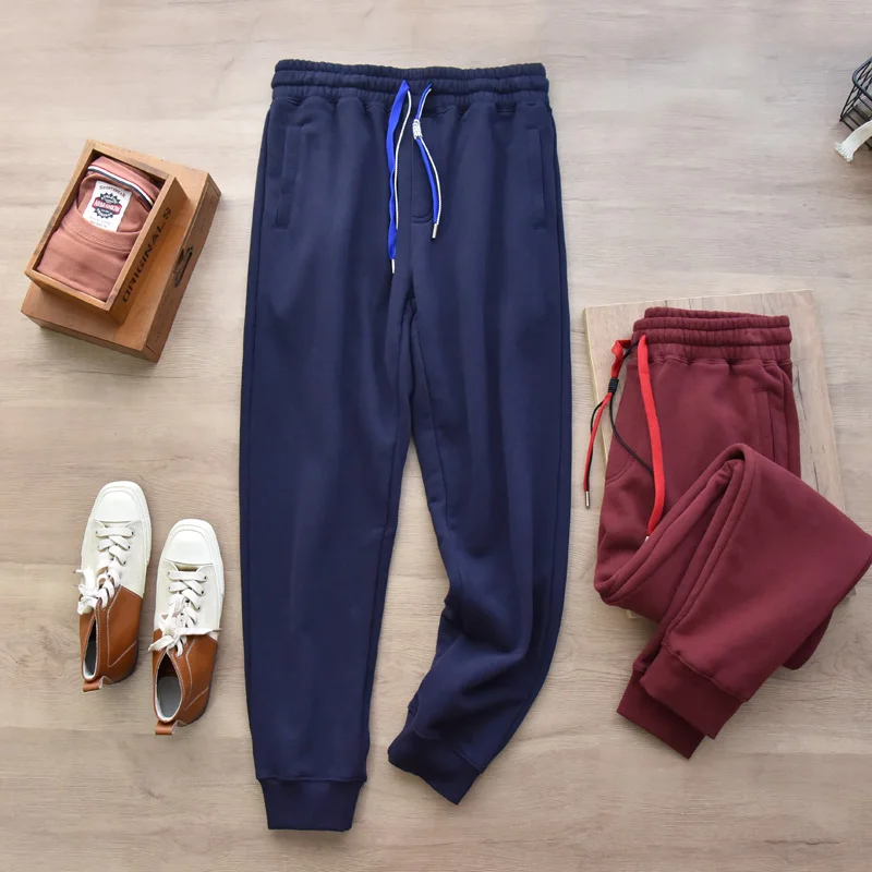 Add velvet padded leg pants in autumn and winter men\'s loose casual sweatpants.