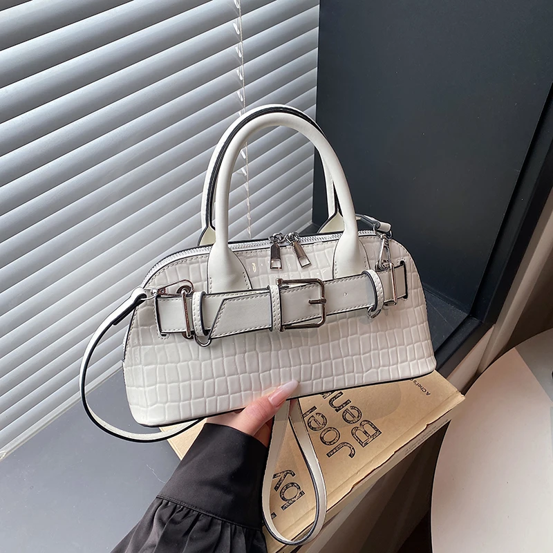 

Stylish Shoulder Bag For Women In Durable Leather, By Famous Designer With Inner Slots, Comfortable Carry And Chic Look