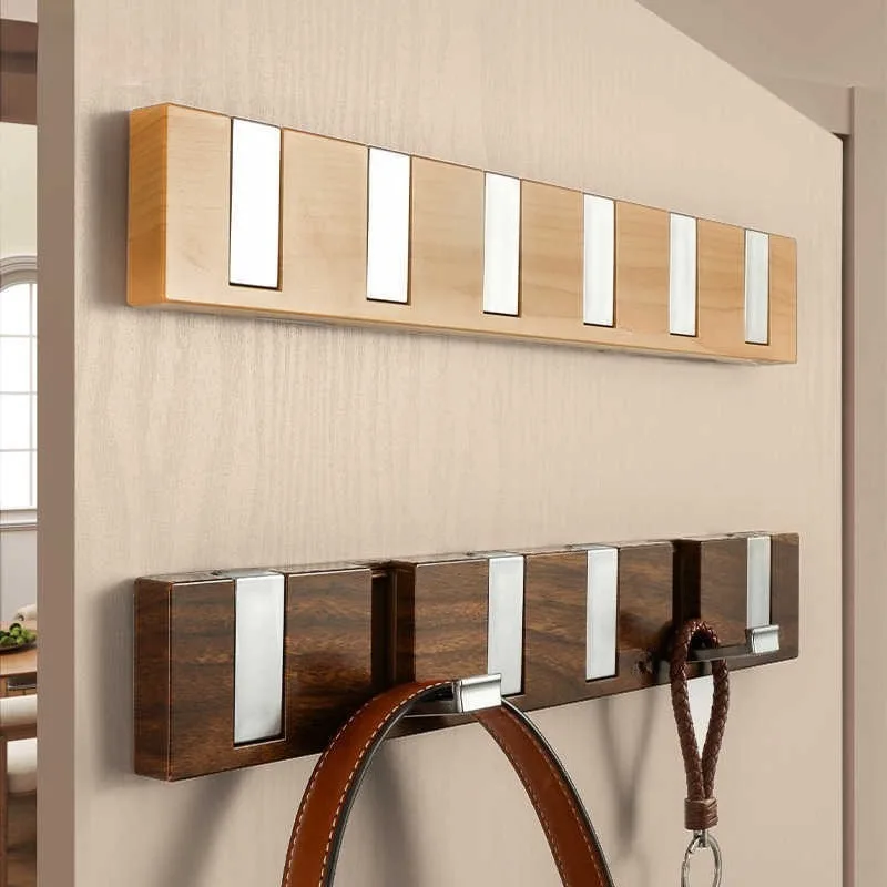 

No punching on the hook behind the door, clothes and bags storage rack, and hanger on the door.