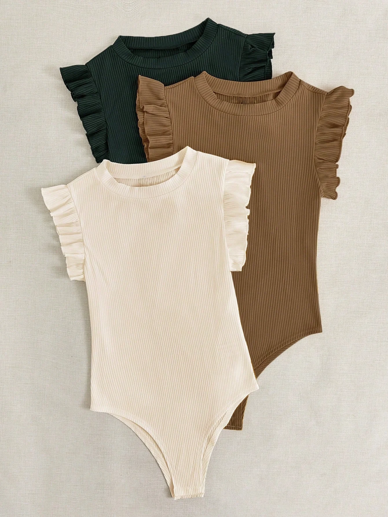 

Женский повседневный облегающий универсальный эластичный облегающий топ с круглым вырезом из трех предметов.