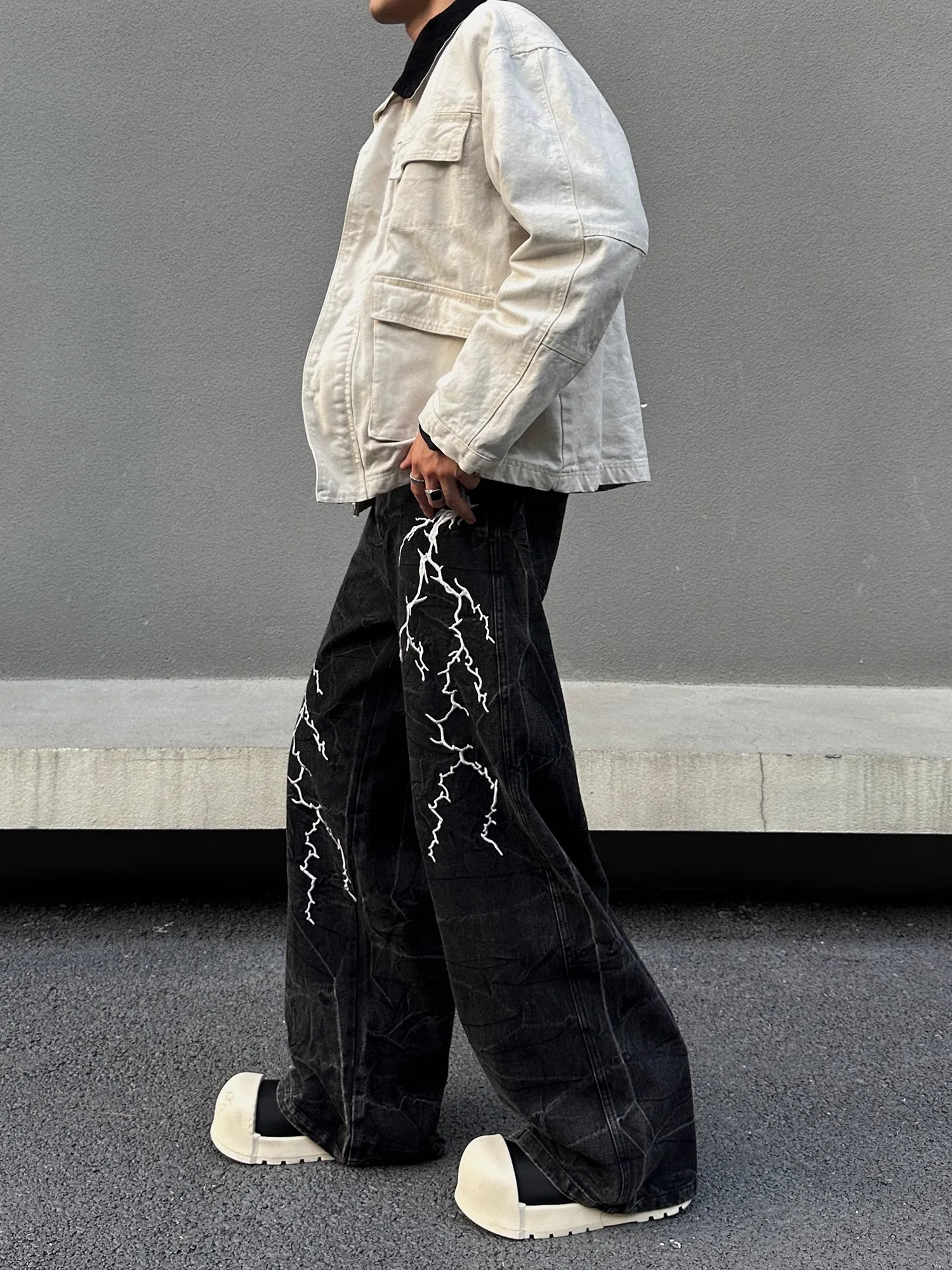 Amerikaanse retro straat geborduurde bliksem losse jeans heren dames hiphop klein ontwerp broek met rechte pijpen casual denim jeans