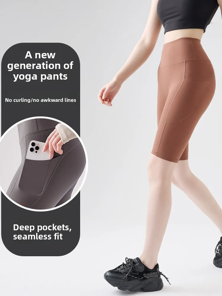 กางเกงโยคะผ้าไหมน้ำแข็งบางเบา รุ่นใหม่ ปี 2025 ทรงห้าส่วน เอวสูง ดีไซน์เก๋ สำหรับผู้หญิง เหมาะสำหรับใส่ออกกำลังกายกลางแจ้งในฤดูร้อน