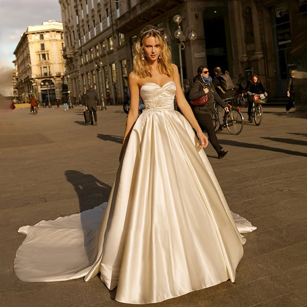 

Furtanseo Charming A Line Wedding Dress Lace Appliques Sweep Train Sleeveless Sweetheart Satin Modern Bridal Gowns Custom