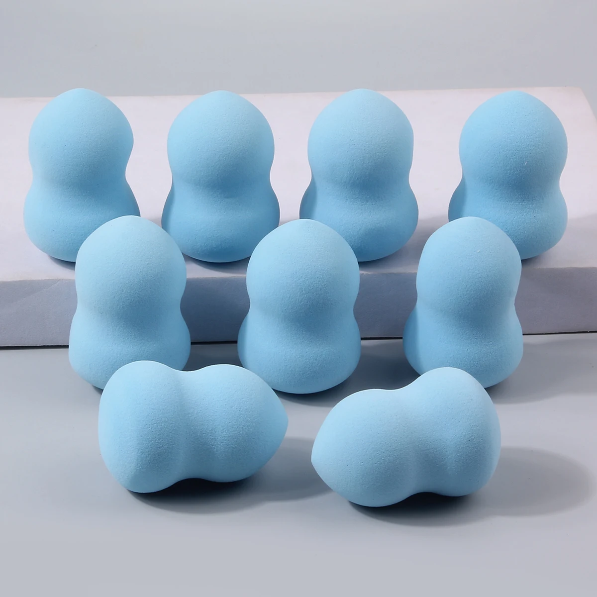 9-delige set blauwe kalebas schoonheidsei, draagbaar spons-ei voor zowel droog als nat gebruik, foundation make-up ei voor beginners