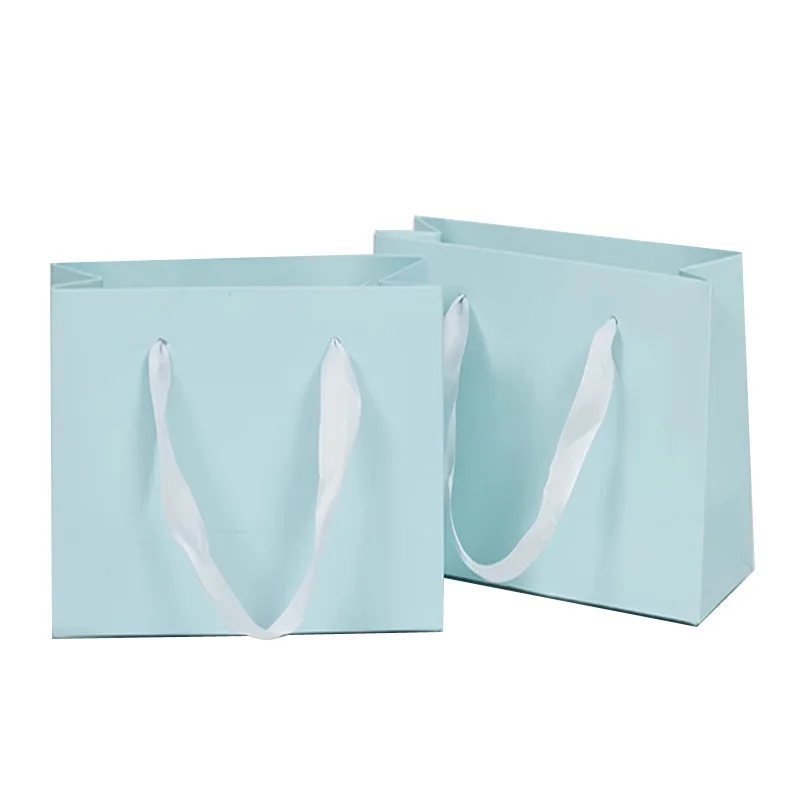 Light Pink Blue Paper Bags With Ribbon Handles Candy Gift Accessories Clothing Packing Bags Stock Custom Logo