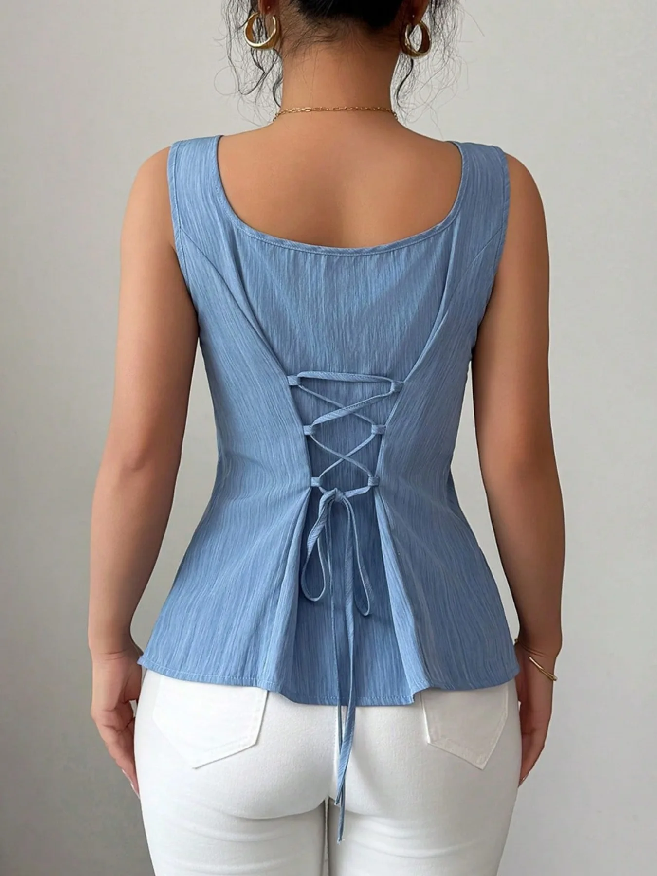 Moda de verano nuevo chaleco francés ajustado adelgazante con correa trasera sin mangas y cuello cuadrado