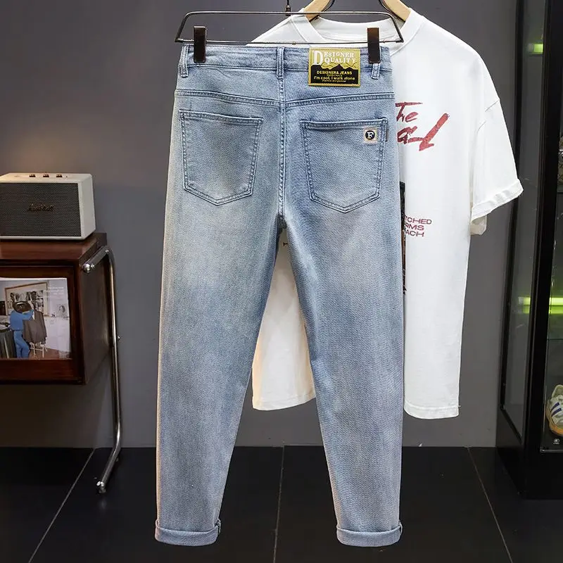 Pantalones vaqueros informales de moda bordados para hombre, pantalón ajustado gris carbón, venta al por mayor, otoño e invierno, novedad