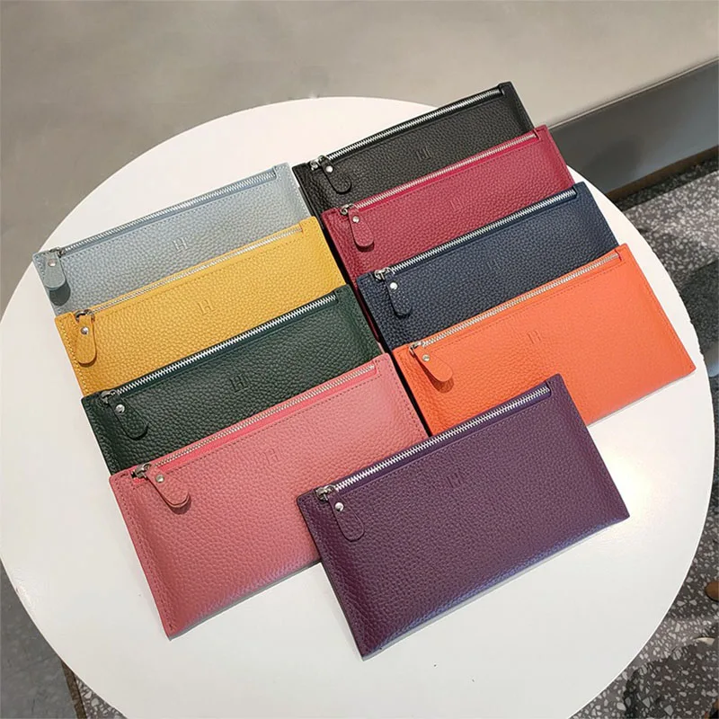 Ladies bag luxury ultra-thin explosions clutch wallet leather wallet female long niche design exquisite high-end coin purse.