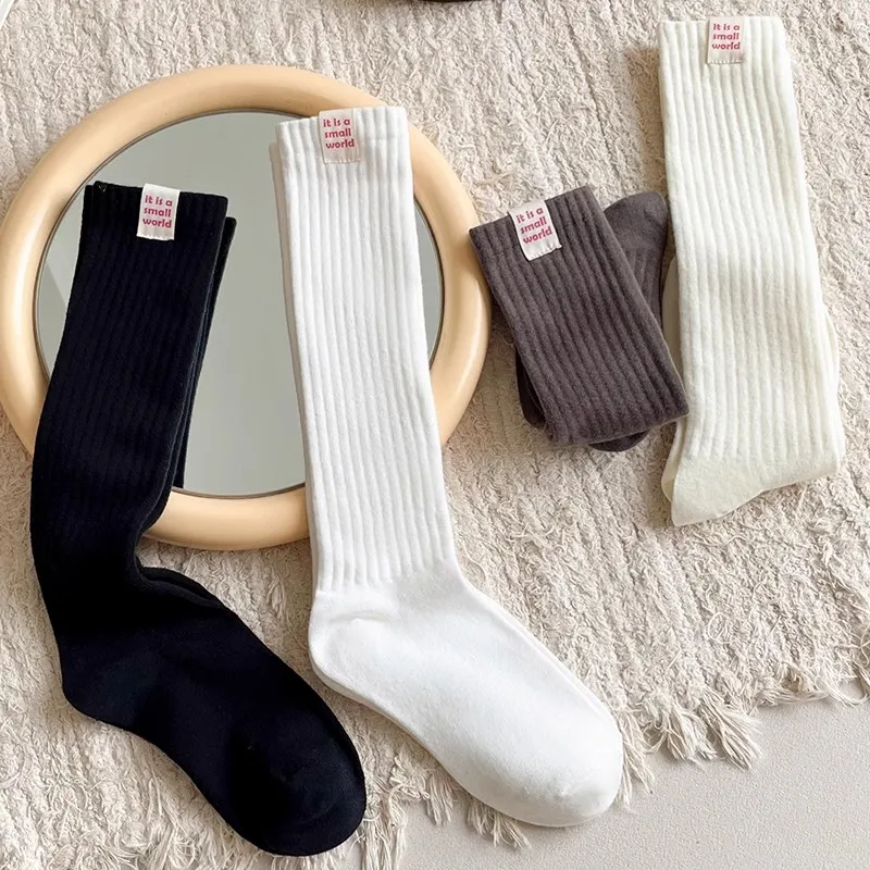 Chaussettes hautes décontractées pour femmes, bas pour femmes, style coréen, document solide, mode automne, dame de rue, chaussettes longues simples, nouveau