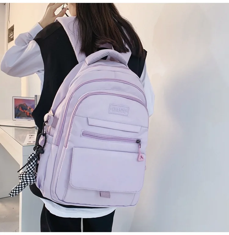 2024 Simple student bag solid color schoolbag With pendant large capacity travel backpack High quality canvas school bag bookbag