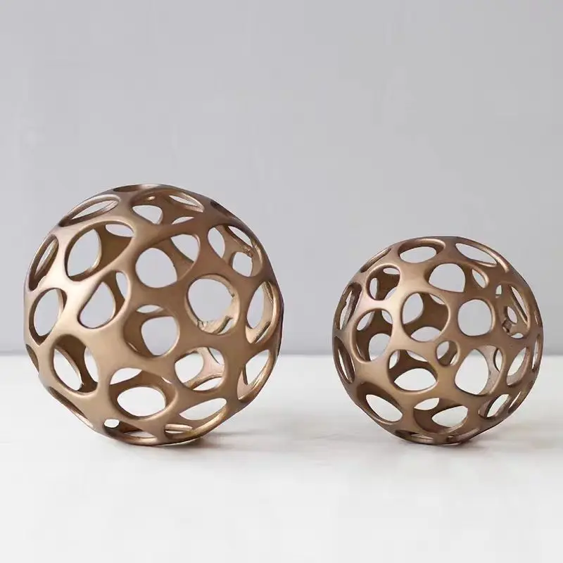 

Modern simple Nordic metal hollow ball ornament model room light luxury soft decoration