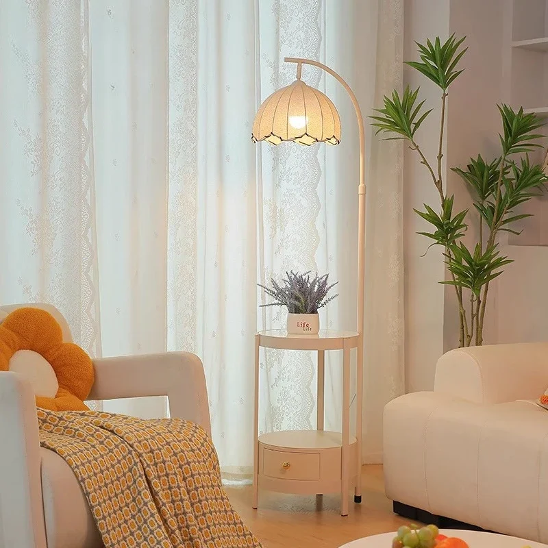 

Cream wind floor lamp living room bedroom sofa next to a few shelves bedside table lamp integrated