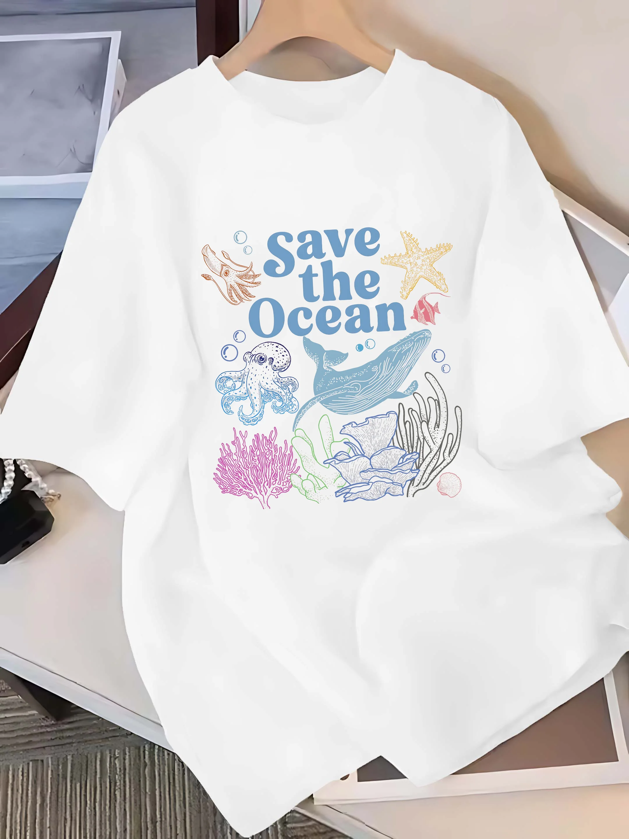 

Plus - Size Tee: “Save the Ocean” Marine Life & Coral Print