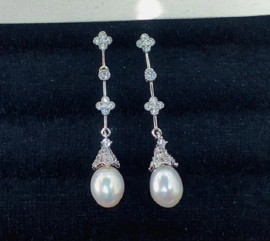 

Потрясающие серьги с белым жемчугом Южных морских пресноводных жемчужинами диаметром 10-13 мм, серебро 925 пробы.