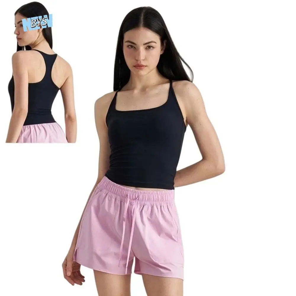 Damska sportowa koszulka bez rękawów, top na ramiączkach, odkryte ramiona, jednolity kolor, krótka, dopasowana koszulka do jogi, krótki top typu tank top.