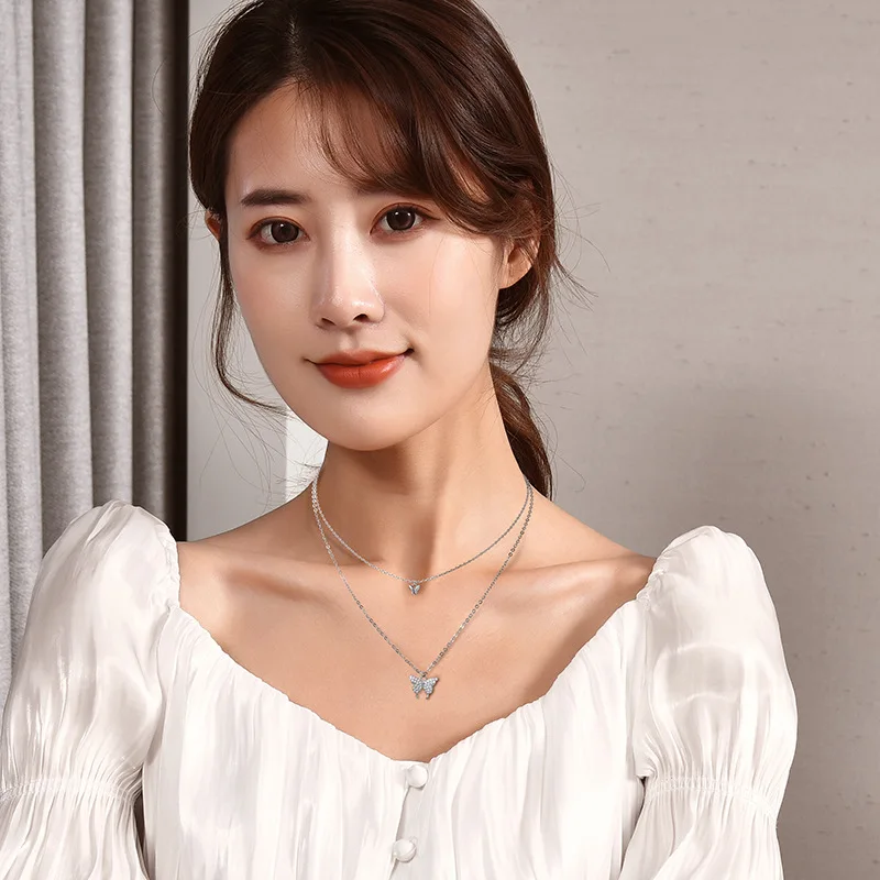 Nuova collana a farfalla da donna a doppio strato in acciaio al titanio, catena con clavicola a farfalla