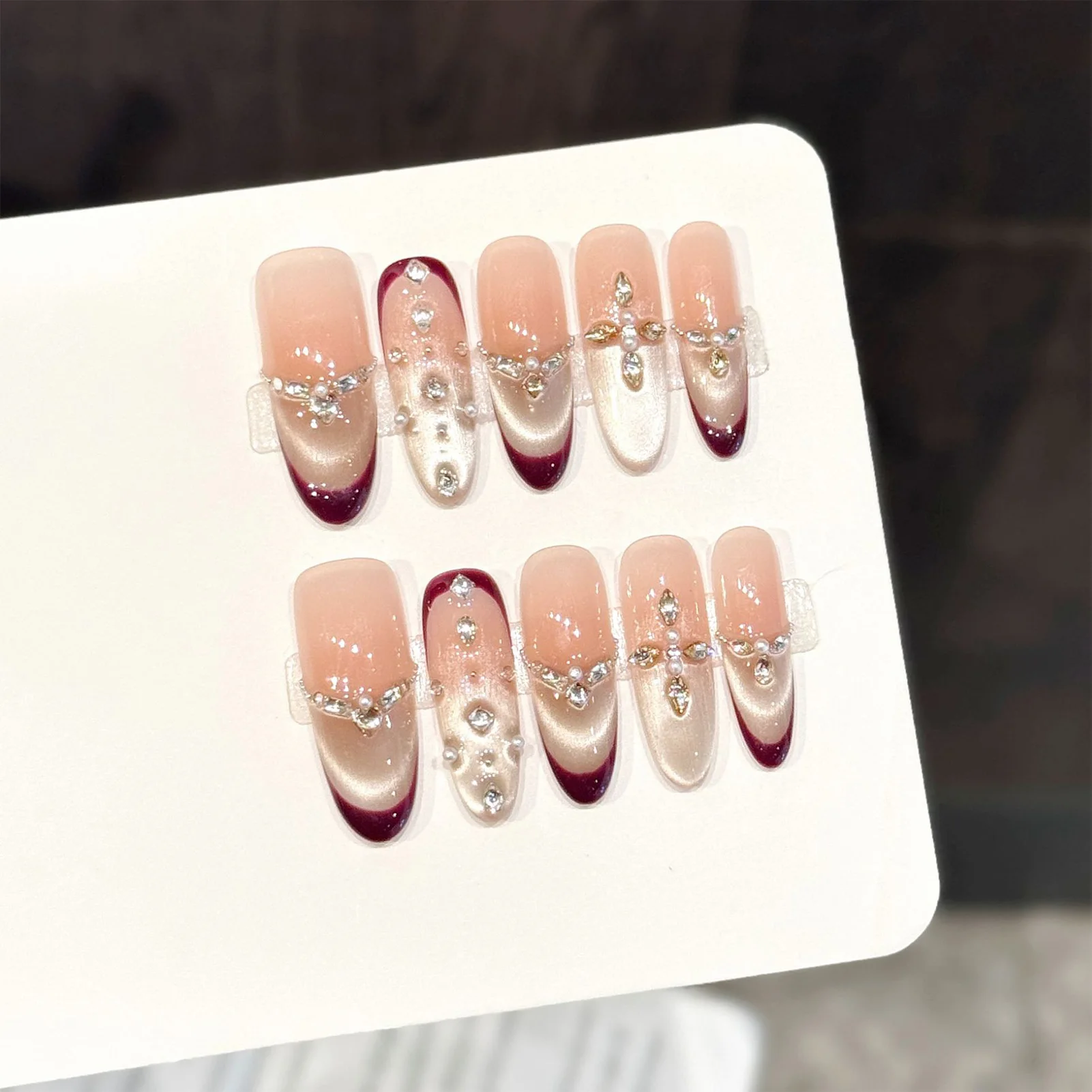 10 Stück Neujahr handgemachte Press on Nails Glitter Light Luxury Cat's Eye Fake Nails Wearable Diamond Decor French False Nail Tips