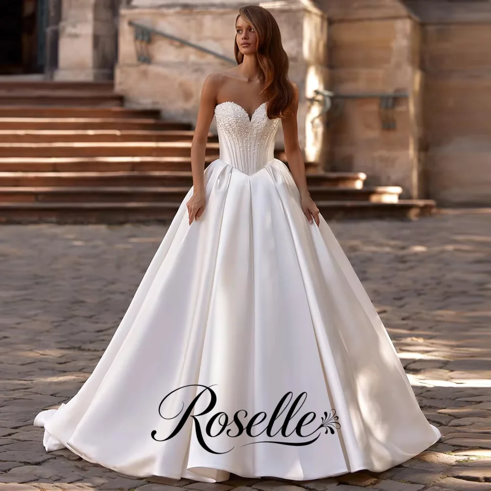 Charming Ball Gown Wedding Dress Customized Sweetheart Sleeveless Pearls Applique Sweep Train Corset Bridal Gown Robe Mariee