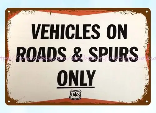 vehicles on roads spurs only  metal tin sign