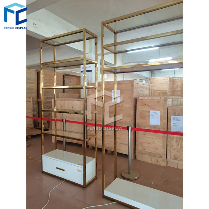 

2025customized.Modern Style Golden Metal Garment Clothing Display Racks Standing Clothes Shop