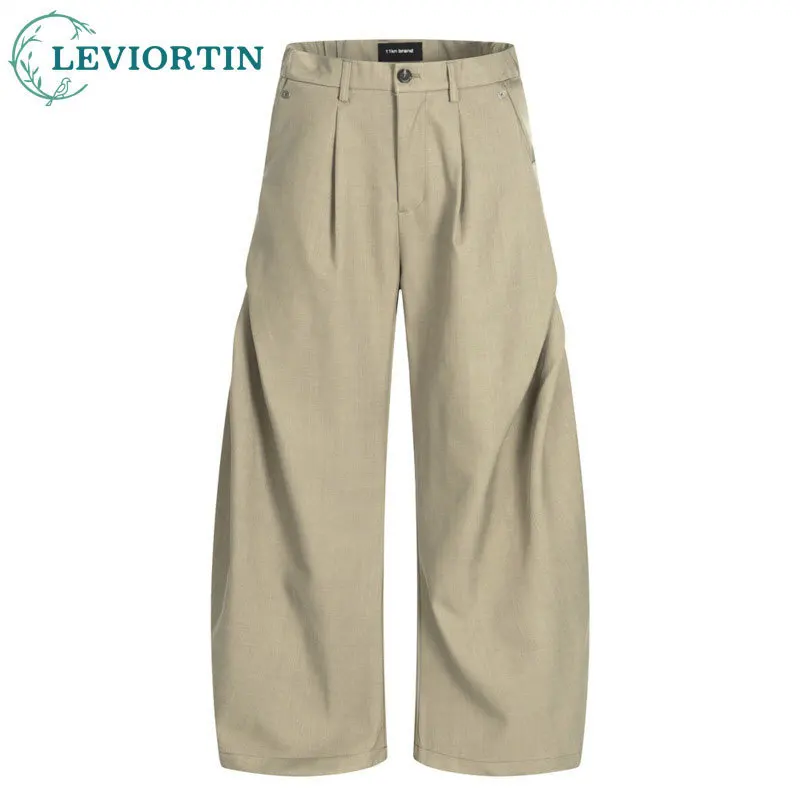 تصميم جيب عكسي بلون سادة للرجال مع صورة ظلية مطوية وشفرة منحنية وسراويل فضفاضة واسعة الساق