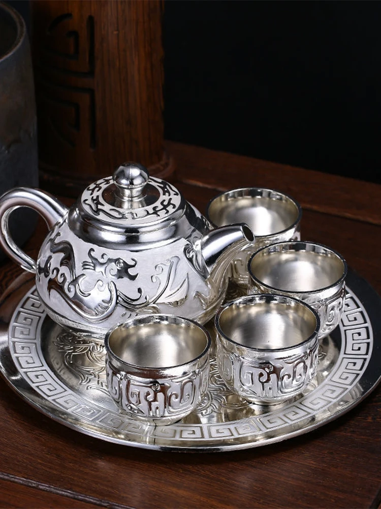 

Sterling silver tea set Longfeng 999 sterling silver retro cooked silver tea set 1 plate 1 Pot 6 cups European retro Chinese sty