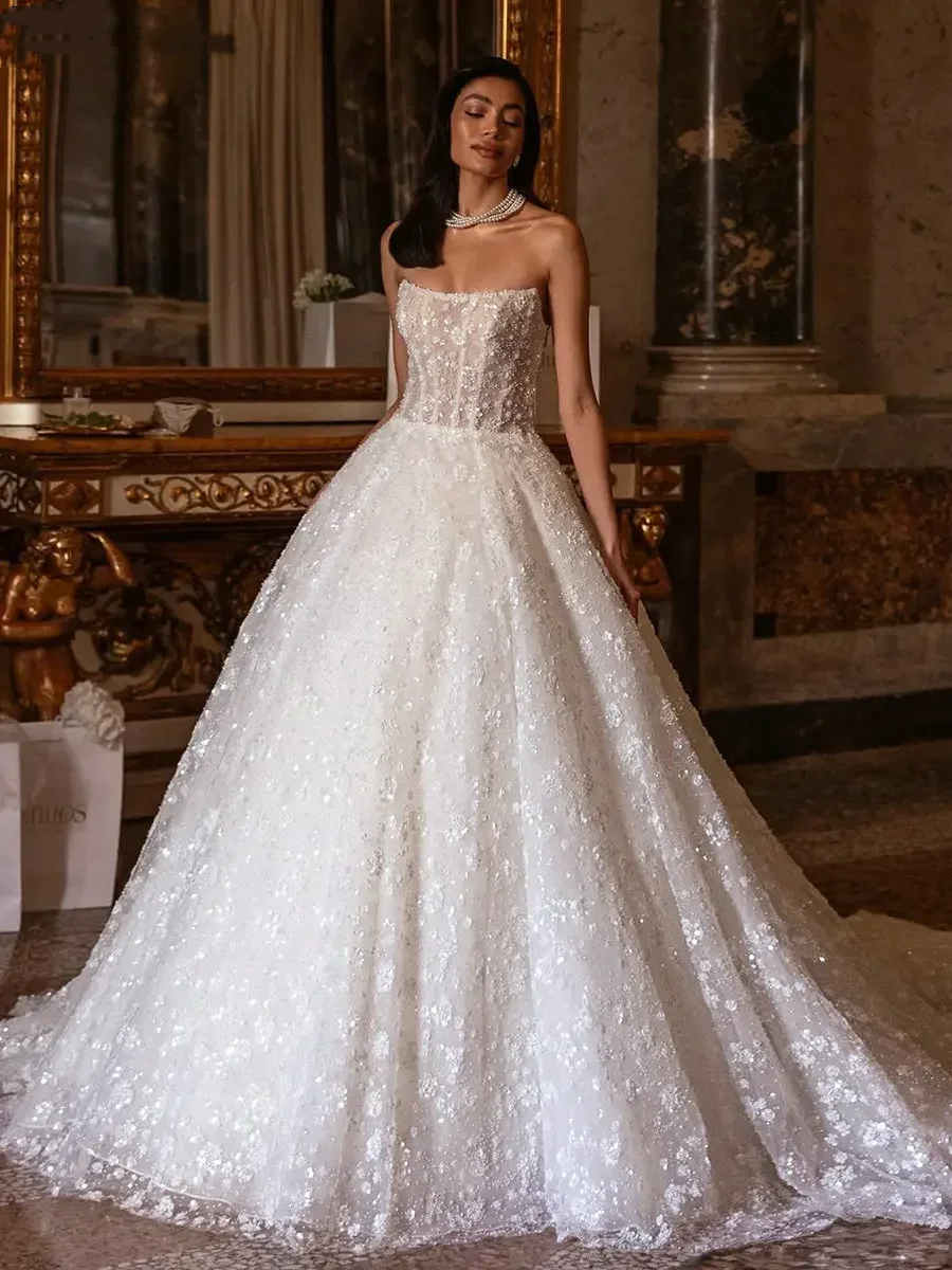 Luxurious A-Line Sheer Sequin Crystal Decal Women's Wedding Dress 2026 Sexy Strapless Backless Ball Party Bridal Gown Customized
