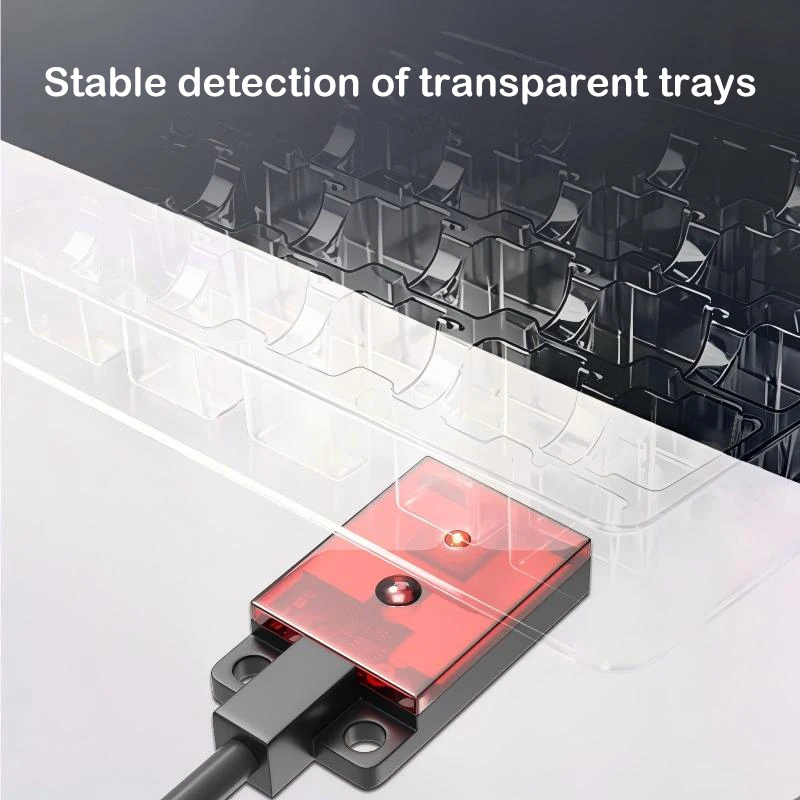 The tray detection ultra-thin background suppression photoelectric sensor is not affected by color.
