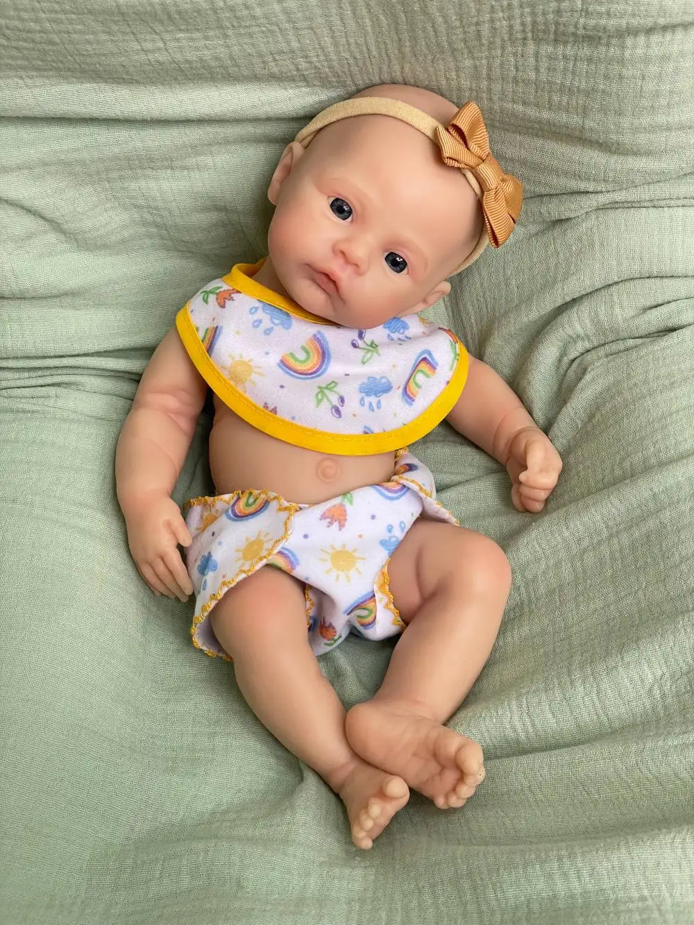 Bambola rinata per tutto il corpo in silicone da 12 pollici, occhi aperti realistici, bella bambina